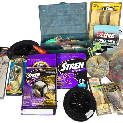 An Assortment of Fishing Tackle and Accessories Featuring Bill Dance Signature Lures