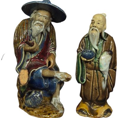 A Pair of Chinese Shiwan Glazed Pottery Mudmen Figurines