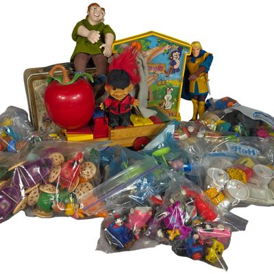 A Large Collection of Vintage Toys Including Fisher-Price Happy Apple, Disney Burger King Premiums, and McDonald’s Happy Meal Changeables