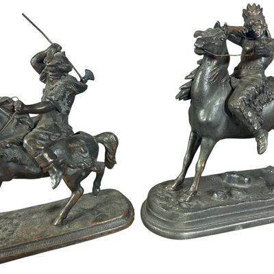 A Pair of Patinated Spelter Equestrian Sculptures