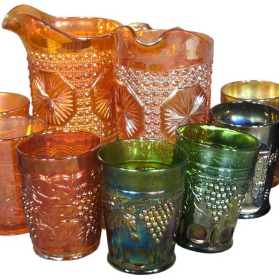 A Collection of Twelve Antique Carnival Glass Pitchers Mugs and Tumblers Including Northwood and Fenton