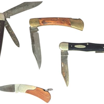 An Assortment of Four Folding Pocket Knives Including Case and Camillus Examples