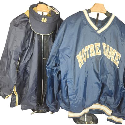 A Trio of University of Notre Dame Fighting Irish Apparel Including Starter Brand Jackets