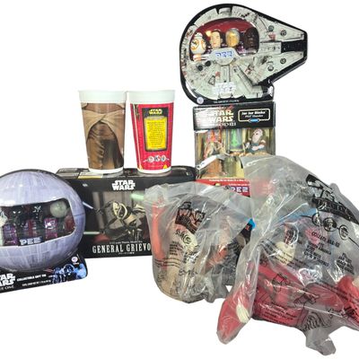 A Group of Star Wars Collectibles including Bandai Model Kit and PEZ Gift Tins