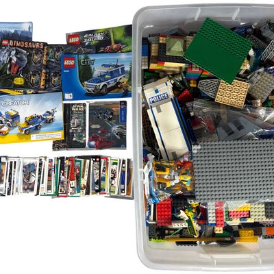 An Assortment of LEGO Construction Toys, NFL Trading Cards, and Collectible Figures