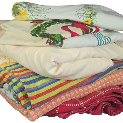 A Collection of Vintage Cotton and Linen Tablecloths and Textiles