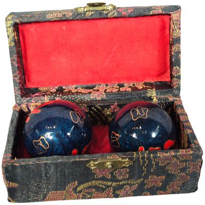 A Pair of Chinese Enamel Baoding Chime Balls in a Brocade Box
