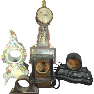 A Collection of Five Clocks and Clock Cases Including a Seth Thomas Banjo Wall Clock
