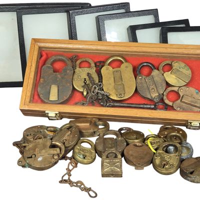 A Collection of Antique and Vintage Brass and Iron Padlocks with Keys and Display Cases