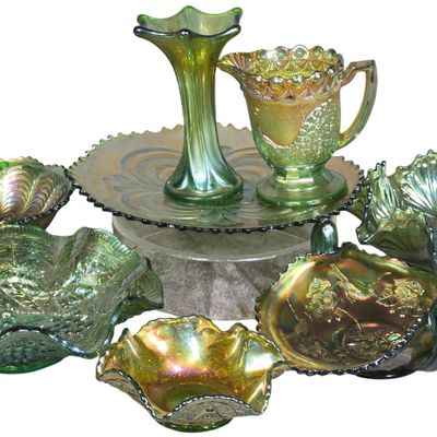 An Assortment of Eight Green Iridescent Carnival Glass Pieces Including Uranium Glass