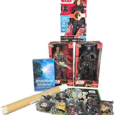 A Collection of Star Wars Action Figures, Art Cards, and Promotional Memorabilia