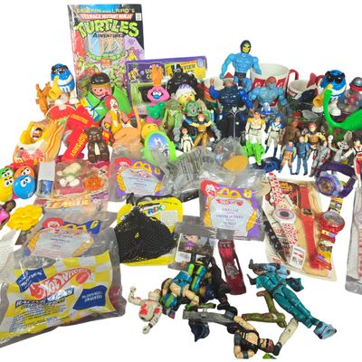 An Assortment of Vintage Action Figures, Fast Food Toys, and Pop Culture Collectibles