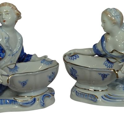 A Pair of Meissen Porcelain Figural Sweetmeat Dishes