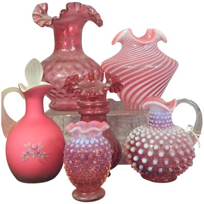 A Collection of Fenton Cranberry Opalescent and Rose Satin Art Glass