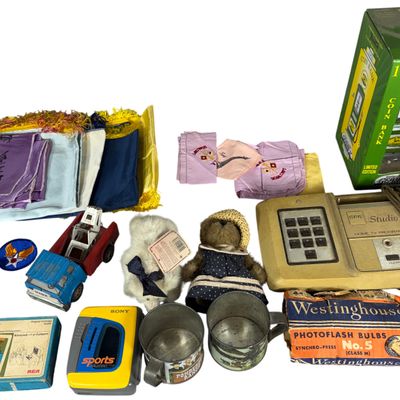 An Assortment of Vintage Electronics, Toys, and Memorabilia including RCA Studio II, Sony Walkman, and Marx Tin Truck