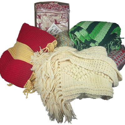 A Collection of Six Handcrafted Crochet Afghans and a Commemorative Woven Coverlet