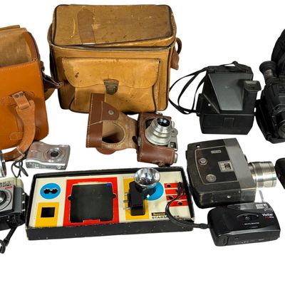 An Assortment of Vintage and Modern Cameras, Movie Equipment, and Accessories