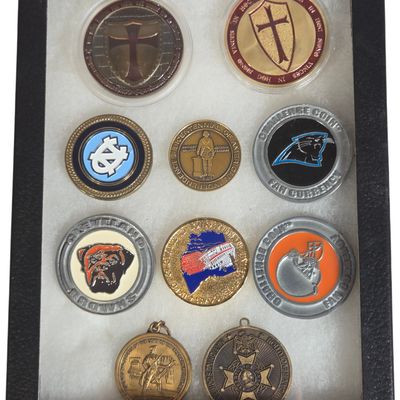 A Collection of Sports, Fraternal, and Historical Commemorative Coins and Medals in Display Case
