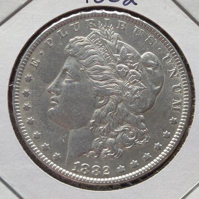 Sale Photo Thumbnail #102: 1882 Morgan Silver Dollar, 90% Silver, 26.73g