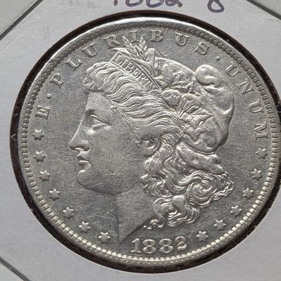 Sale Photo Thumbnail #111: 1882-O Morgan Dollar, 90% Silver - 26.73g