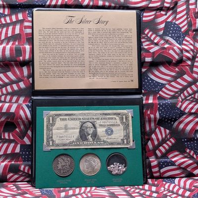 The Silver Story Set by Treasure Album Dist. - Includes 1899-O Morgan Dollar and 1923 Peace 90% Silver Dollars, 26.73g each, with 1957...