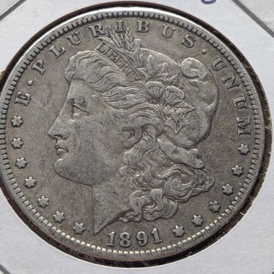 Sale Photo Thumbnail #444: 1891-O Morgan Dollar, .900 Fine Silver, 26.73g