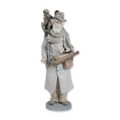 Sale Photo Thumbnail #454: Lladro Porcelain Organ Grinder 5046 Figurine