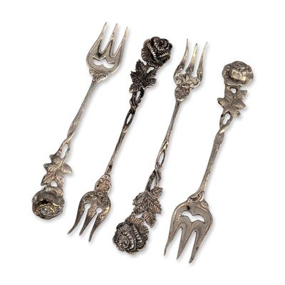 Sale Photo Thumbnail #502: Four German 800 Silver Hildesheimer Rose Forks