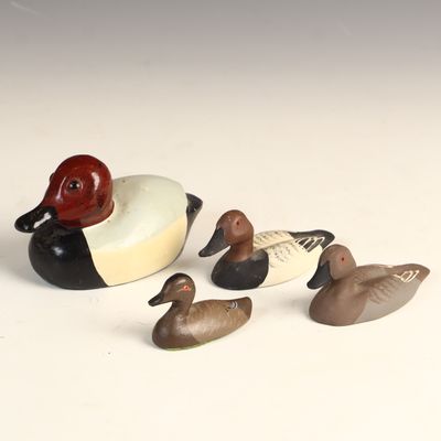 Sale Photo Thumbnail #79: A Collection of Four Canvasback Duck Decoys Including Leonard Burcham and Iron Feathers Examples