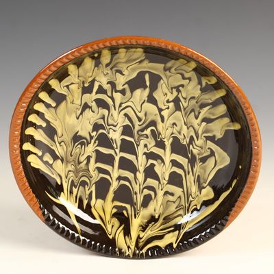 Sale Photo Thumbnail #127: Colonial Williamsburg Restoration Redware Feathered Slipware Charger