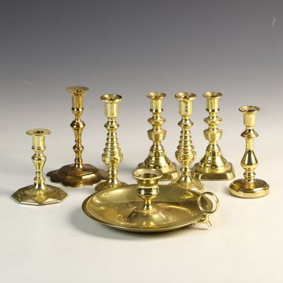 Sale Photo Thumbnail #4: An Assortment of Eight Baldwin and Historic Charleston Polished Brass Candlesticks and a Chamberstick