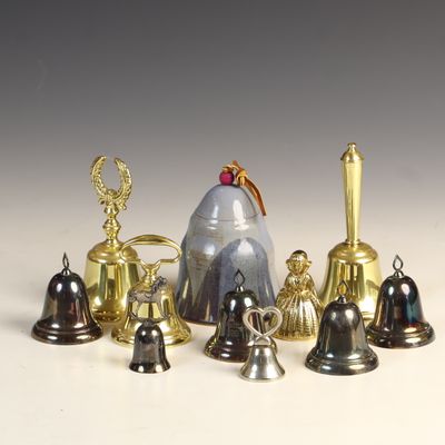Sale Photo Thumbnail #24: A Collection of Decorative Brass, Stoneware, and Silverplate Bells including Commemorative Examples