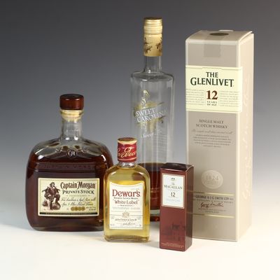 Sale Photo Thumbnail #8: A Collection of Five Assorted Distilled Spirit Bottles Including The Glenlivet 12 Year Old Single Malt Scotch Whisky
