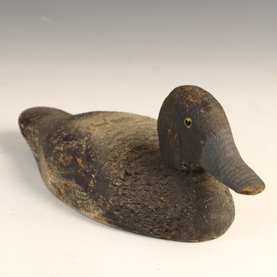Sale Photo Thumbnail #54: Early 20th Century Hand Carved Wooden Bluebill Duck Decoy