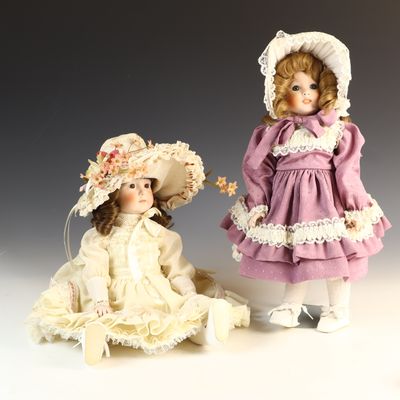 Sale Photo Thumbnail #165: A Pair of Collectible Bisque Porcelain Dolls in Victorian Dress