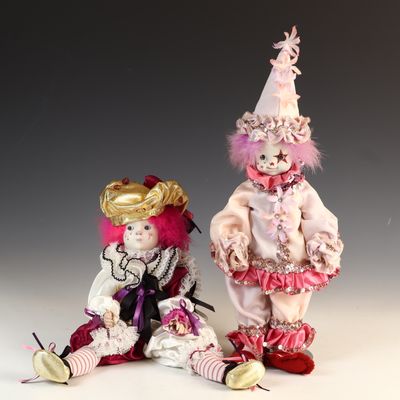Sale Photo Thumbnail #164: A Pair of Porcelain-Headed Collector Harlequin Clown Dolls