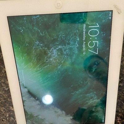 Sale Photo Thumbnail #43: Older models. The iPad is a 4th-generation model from November 2012, and the iPhone is a 5th-generation model from September 2012.