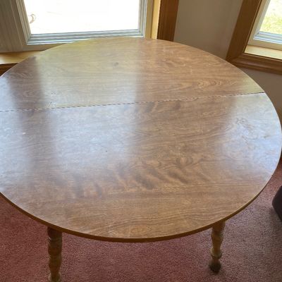 Sale Photo Thumbnail #175: Round table has wobbly legs