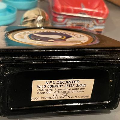 Sale Photo Thumbnail #403: There is some cologne in the bottle