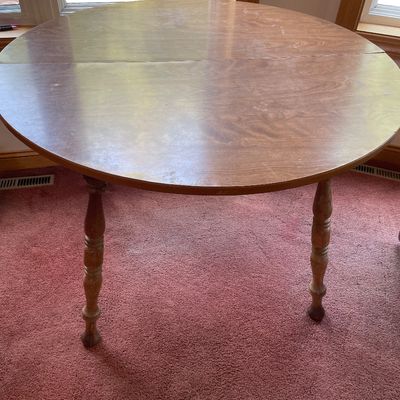 Sale Photo Thumbnail #176: Round table has wobbly legs