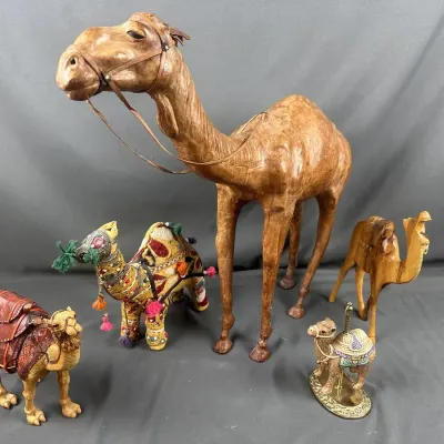 Assorted Camel Figurines in Leather, Fabric, and Wood