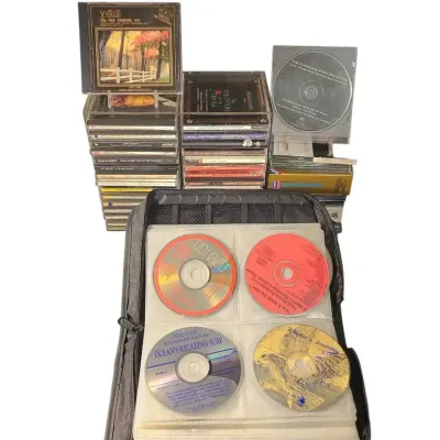 DG620 Assorted Classical & Soundtrack Music CDs with Storage Binder