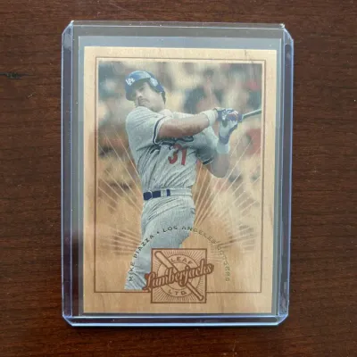 1995 Leaf Baseball Card. Mike Piazza - Lumberjacks Insert. Numbered /5000. Card #6
