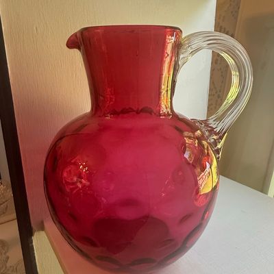 Sale Photo Thumbnail #115: Vintage Cranberry Glass Pitcher with Inverted Thumbprint Pattern and Reeded Handle