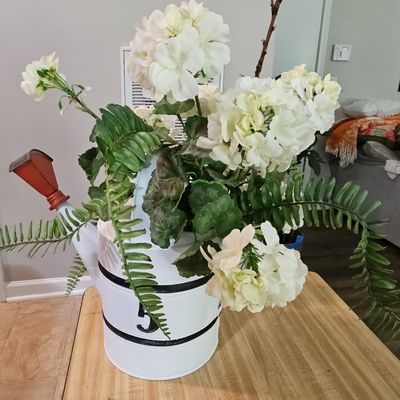 Sale Photo Thumbnail #695: White Watering Can Planter with White Geranium and Fern Arrangement