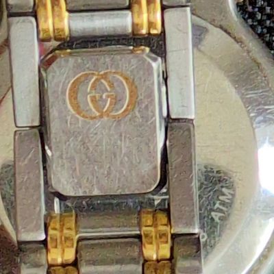 Sale Photo Thumbnail #311: Gucci 9000L Two-Tone Quartz Watch