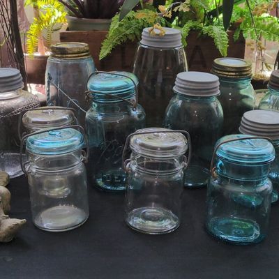 Collection of Vintage Blue Glass Mason and Canning Jars with Wire Bails