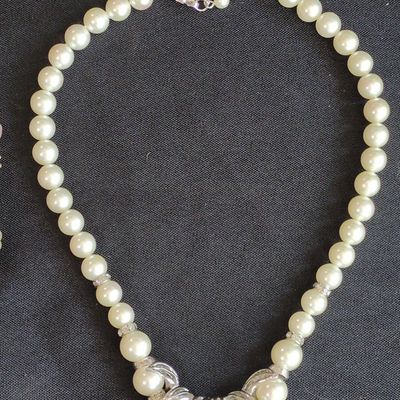 Sale Photo Thumbnail #352: Vintage Faux Pearl Necklace with Rhinestone Accents and Silver-Tone Leaf Clasp