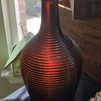 Sale Photo Thumbnail #127: Vintage Amber Swirl Ribbed Glass Gallon Bottle