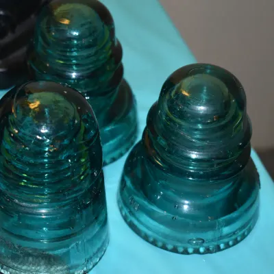Hemingray insulators: two 42s and one 21